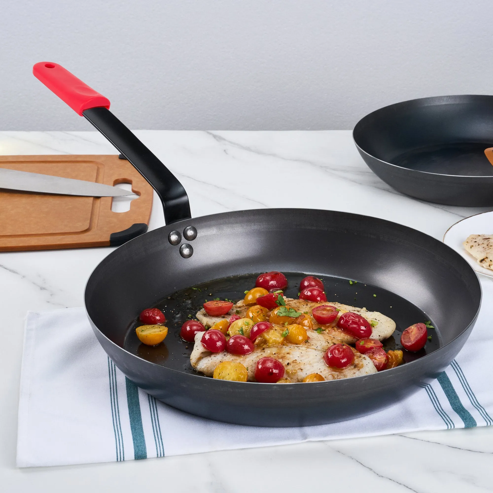Met Lux 1 Black Carbon Steel 14" Pre-Seasoned Fry Pan and 1 Red Silicone Pan Handle Sleeve