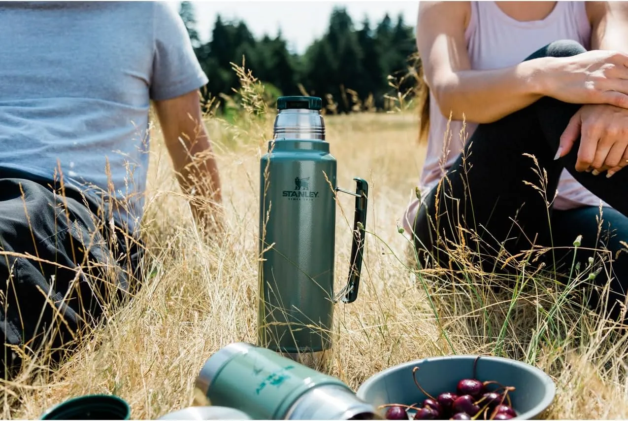 Stanley Classic Legendary Vacuum Bottle 20 oz | Wide Mouth with Leakproof Cup Lid | Keep Drinks Hot or Cold | Packable for Travel | Insulated Stainless Steel Thermos | BPA-Free | Black 2.0