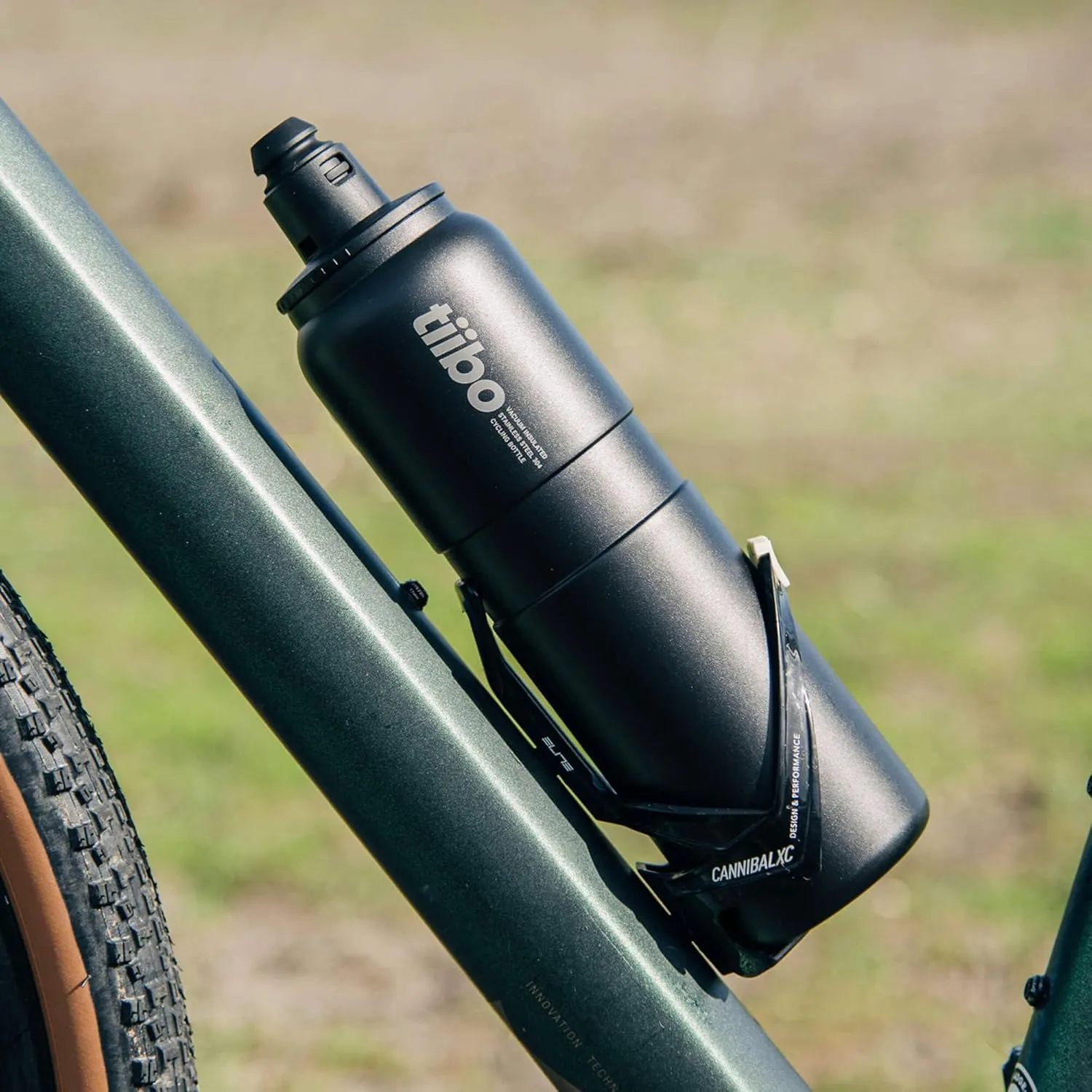 tiibo Vacuum Insulated Stainless Steel Bike Water Bottle, Double Wall, No-Squeeze, Fast Flow Sport Nozzle, Designed for Cycling, Biking, Fitness & Sports, Fits Most Bike Cages (Black, 23OZ)